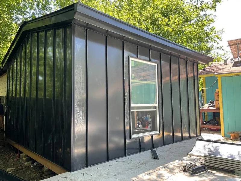 Black standing seam metal wall panels for Roof Inspection in Brooklyn